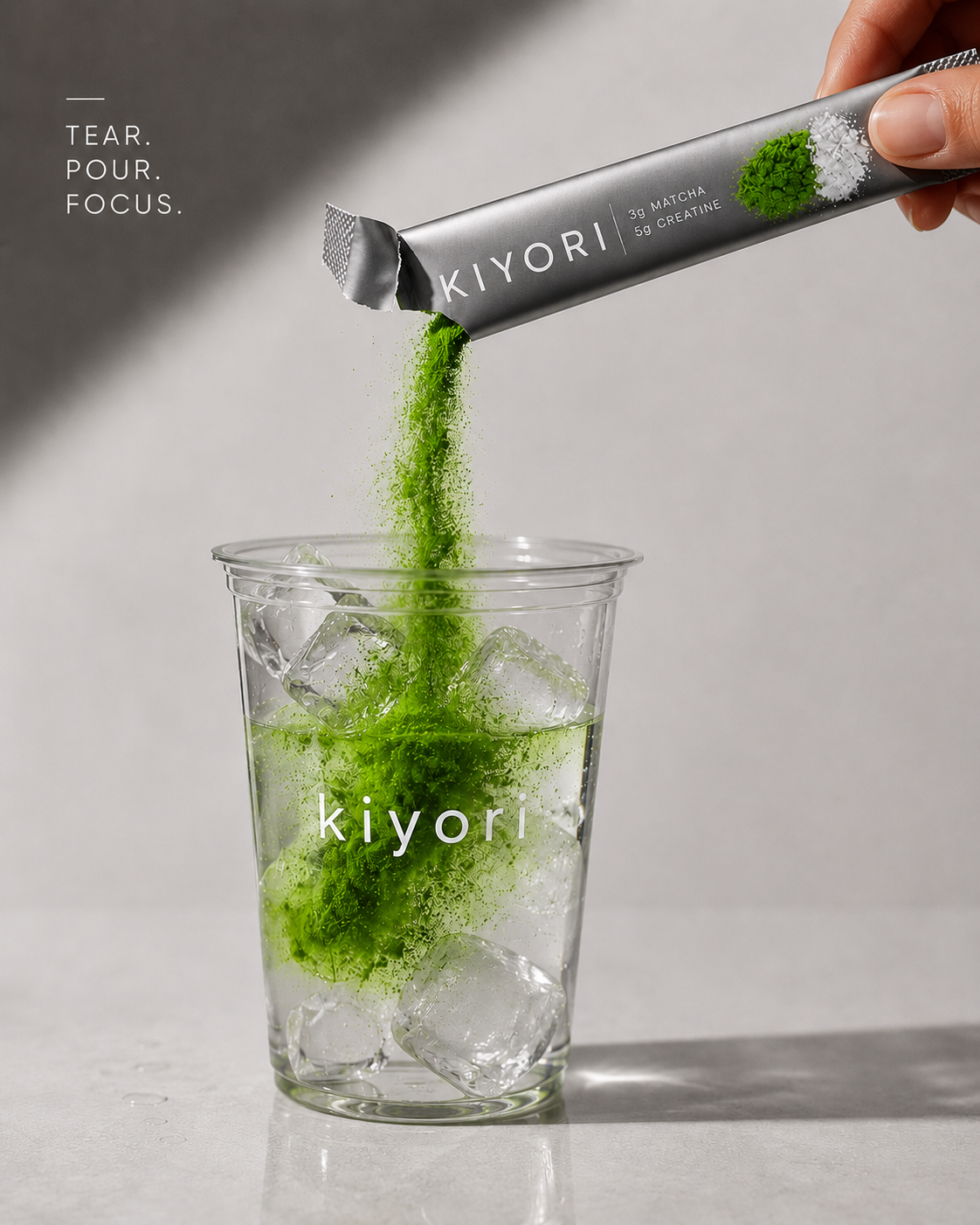 Pouring Kiyori matcha and creatine over ice